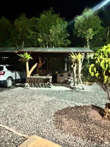 a car parked in front of a house at Morada Silvestre in La Peña