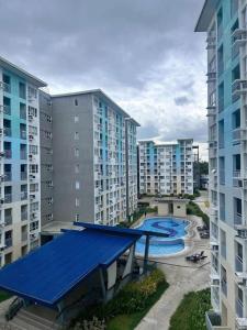 an aerial view of an apartment complex with buildings at Davao Cozy Condo T6 unit 2 in Davao City +5 photos