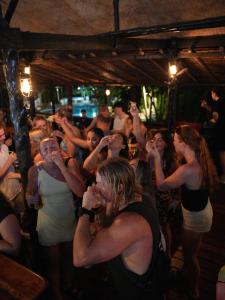 a group of people dancing at a party at Shiralea Resort in Haad Yao +110 photos