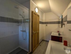 a bathroom with a shower and a sink at Le castillon in Marignac +32 photos