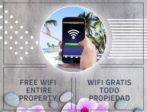 a hand holding a cell phone with a wifi symbol at CARIBBEAN DREAMS at SOL CARIBE - LOS CORALES beach in Punta Cana