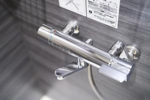 a close up of a shower nozzle in a bathroom at Inside Sangreen - Vacation STAY 22712 in Tokyo