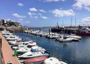 a bunch of boats docked in a harbor at Casa Chus in Foz