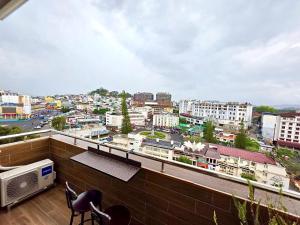 a balcony with a view of a city at Tulip Hotel 2 in Da Lat