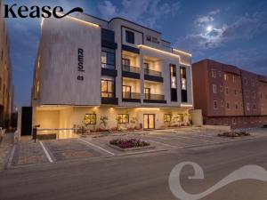 a building with a parking lot in front of it at Kease Hittin S-18 Latest Development ZA44 in Riyadh