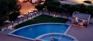 an overhead view of a swimming pool in a yard at Casa Nau B in Armação de Pêra