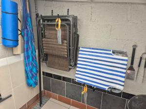 a towel hanging on a rack in a kitchen at High Tide in Braunton +40 photos