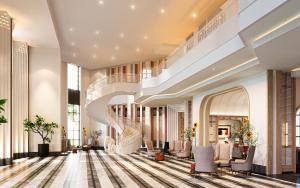 a lobby of a hotel with a spiral staircase at Avani Plus Lanexang Vientiane Hotel in Vientiane +23 photos