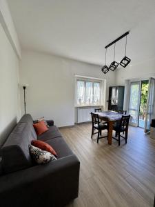 a living room with a couch and a table at Casa dolce Casa in Rapallo