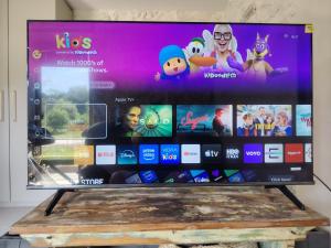a tv screen with many different games on it at VODIČARJEVA HiŠiCA in Grgar +19 photos