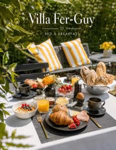 a table with breakfast foods and drinks on it at VILLA FER-GUY " Beeldige Suite met parking, nabij strand en casino" in Knokke-Heist
