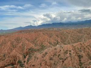 an aerial view of a mountain range at Asman Tör Yurt Camp in Tong +5 photos