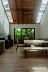an empty room with a large aquarium in the background at The Spice Trail, Ahangama in Ahangama