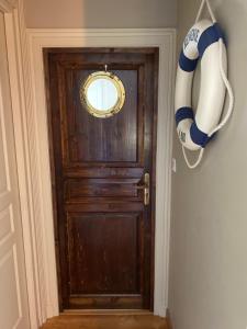 a door with a towel hanging next to it at La Dorépontaise CHAMBRE D'HOTES in Pondaurat