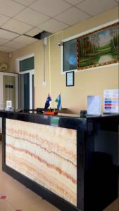 a bar in an office with a counter top at Marvarid INN in Samarkand