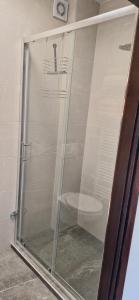 a shower with a glass door in a bathroom at MonteMare Holiday home in Lič +56 photos