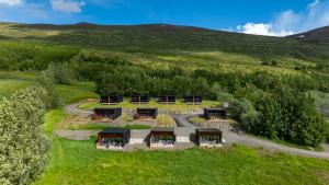 an aerial view of a house on a hill at North Mountain View Suites in Akureyri