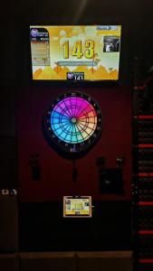 a dart board on the wall of a game room at Przystań Świerkowa 14 - Komfortowy Dom blisko Zamku Ćmielów i Bałtowa in Ostrowiec Świętokrzyski