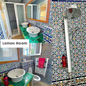 a bathroom with a sink and a tile wall at Villa Omi Zina in Nabeul +10 photos