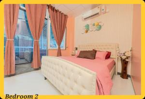 a bedroom with a white bed and a window at UDUPI HOMESTAY CHALET LA BONNE Vie in Udupi +25 photos