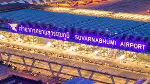 a sign for a train station at night at KaizaHotel Suvarnabhumi Airport in Lat Krabang +23 photos