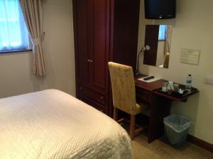 A bed or beds in a room at Crich Lane Farm