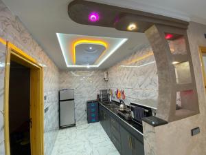 a kitchen with a sink and a counter top at Tamri beach house in Agadir