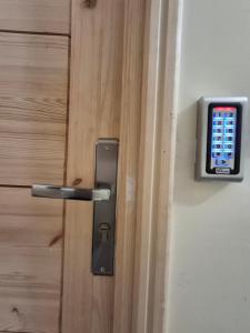 a close up of a door with a smart lock at S1 Modern & Relax in Agadir