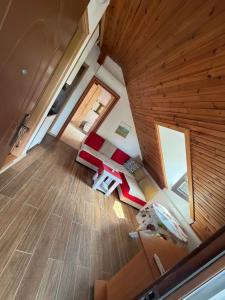an overhead view of a living room with wood floors at Vila Jovicic in Popadić +2 photos