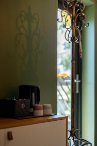 a room with a counter with a mirror and a table at Lendle Peace & Wellness Stay Märjamaa in Märjamaa +6 photos