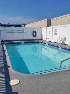 a large swimming pool on top of a building at Atlantis Inn in Rehoboth Beach