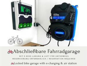 a camera hooked up to a wall with an air station at Ambient Hotel am Europakanal in Fürth
