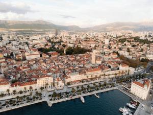 an aerial view of a city with a harbor at Murum Heritage Hotel in Split