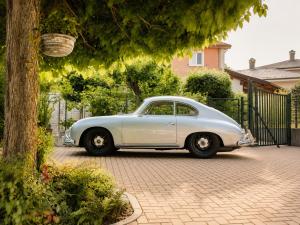 a white car parked in front of a house at Casa Due Marie Boutique stay near Modena & Maranello in Marano sul Panaro +30 photos