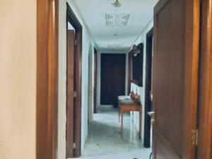 a hallway of a house with an open door at belle appart de luxe CUN in Tunis