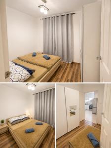 a room with two beds and a window in it at Ametystowa Street in Września