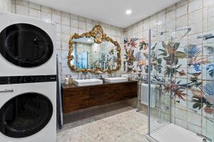 a bathroom with a sink and a mirror at Stonehurst Estate Sleep 16 in Chilliwack +69 photos