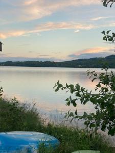 a view of a lake at sunset at Lappnäs Bed & Breakfast in Sunne