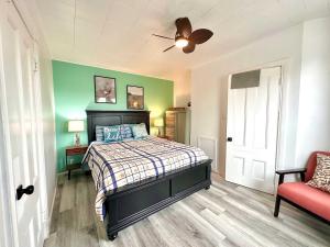 a bedroom with a bed and a ceiling fan at Summer Sale 1BR Big Kitchen by River and Trails in Bridgewater