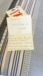 a piece of paper with a handwritten note on top of a sheet of paper at Studio one bed in Clermont