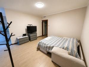 TV tai viihdekeskus majoituspaikassa Cornaro Apartment