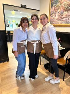 three women posing for a picture in a dance class at Econo Lodge Fredericksburg in Fredericksburg +54 photos