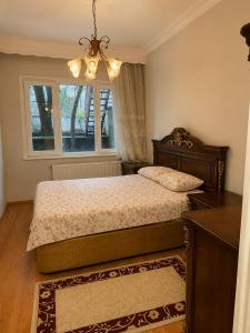 a bedroom with a bed and a window at Twin Double X2 Room in Istanbul