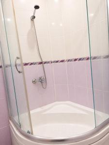 a shower with a glass door in a bathroom at Twin Double X2 Room in Istanbul +17 photos