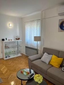 a living room with a couch and a table at Agata in Šibenik