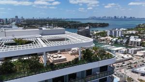 an aerial view of a building with a city at Luxury View-Walk to beach! in Miami Beach