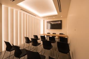 a conference room with a table and chairs at PHEIA, Vriniotis Resorts in Katakolo +53 photos