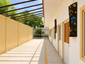an empty hallway of a school building with awning at Punta Sol in Brisas de Zicatela
