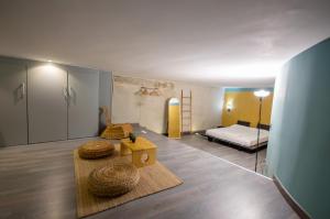 a room with a bedroom with a bed and a table at Apartamento rural Castillo de Yeste 2 pax Especial Parejas in Yeste