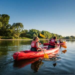 a group of people in kayaks on a river at Les Gîtes du Chemin - La Colombière in Paray-le-Monial